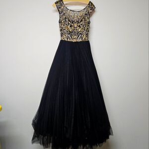 Elegant Black and Gold Evening Gown By Sherri Hill Size 4